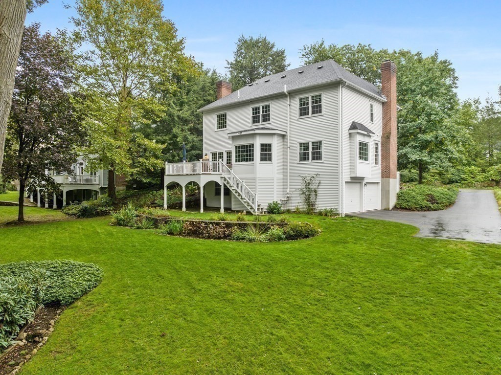 34 Upwey Road Wellesley, MA 02481 - Photo 19 of 19 a view of a house with backyard and garden