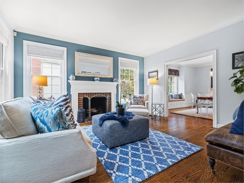 34 Upwey Road Wellesley, MA 02481 - Photo 2 of 19 a living room with furniture and a fireplace