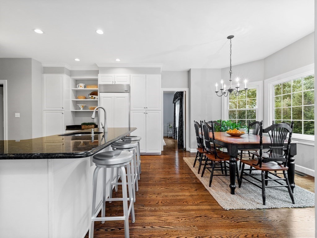 34 Upwey Road Wellesley, MA 02481 - Photo 8 of 19 a view of a dining room with furniture and wooden floor