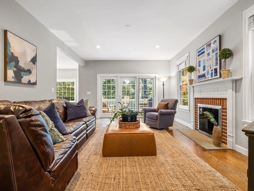 34 Upwey Road Wellesley, MA 02481 - Photo 10 of 19 a living room with furniture large window and fireplace