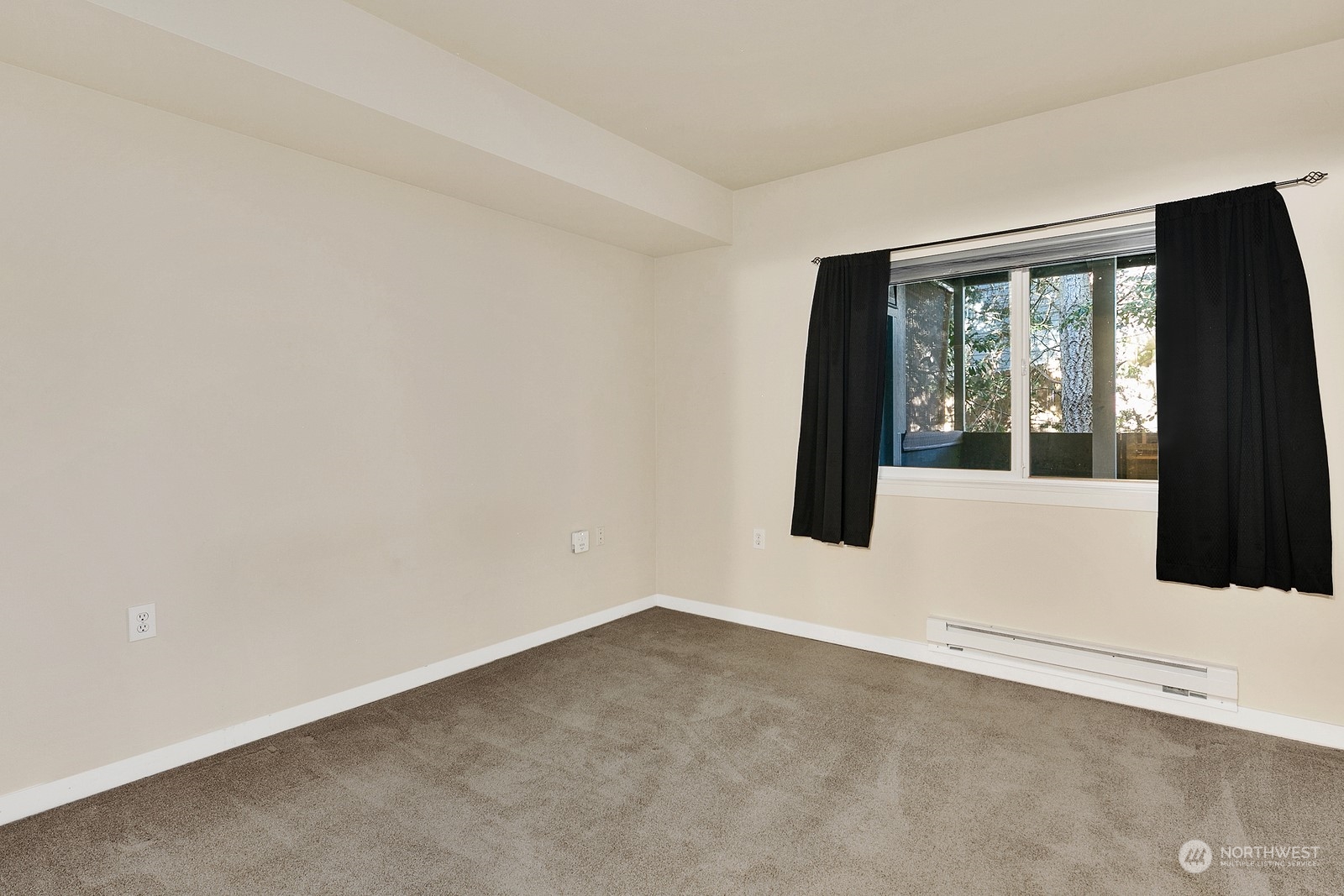 3901 243rd Place Southeast, Unit O104 Bothell, WA 98021 - Photo 16 of 26 an empty room with windows