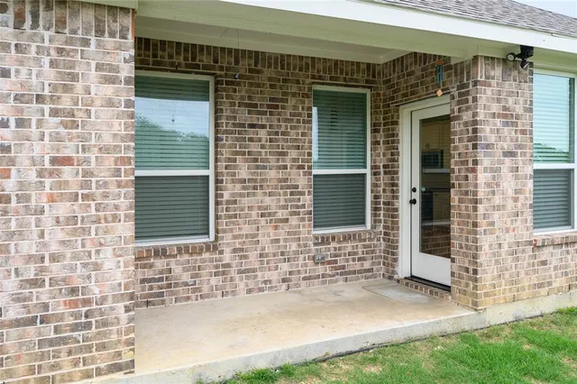 a view of house with front door