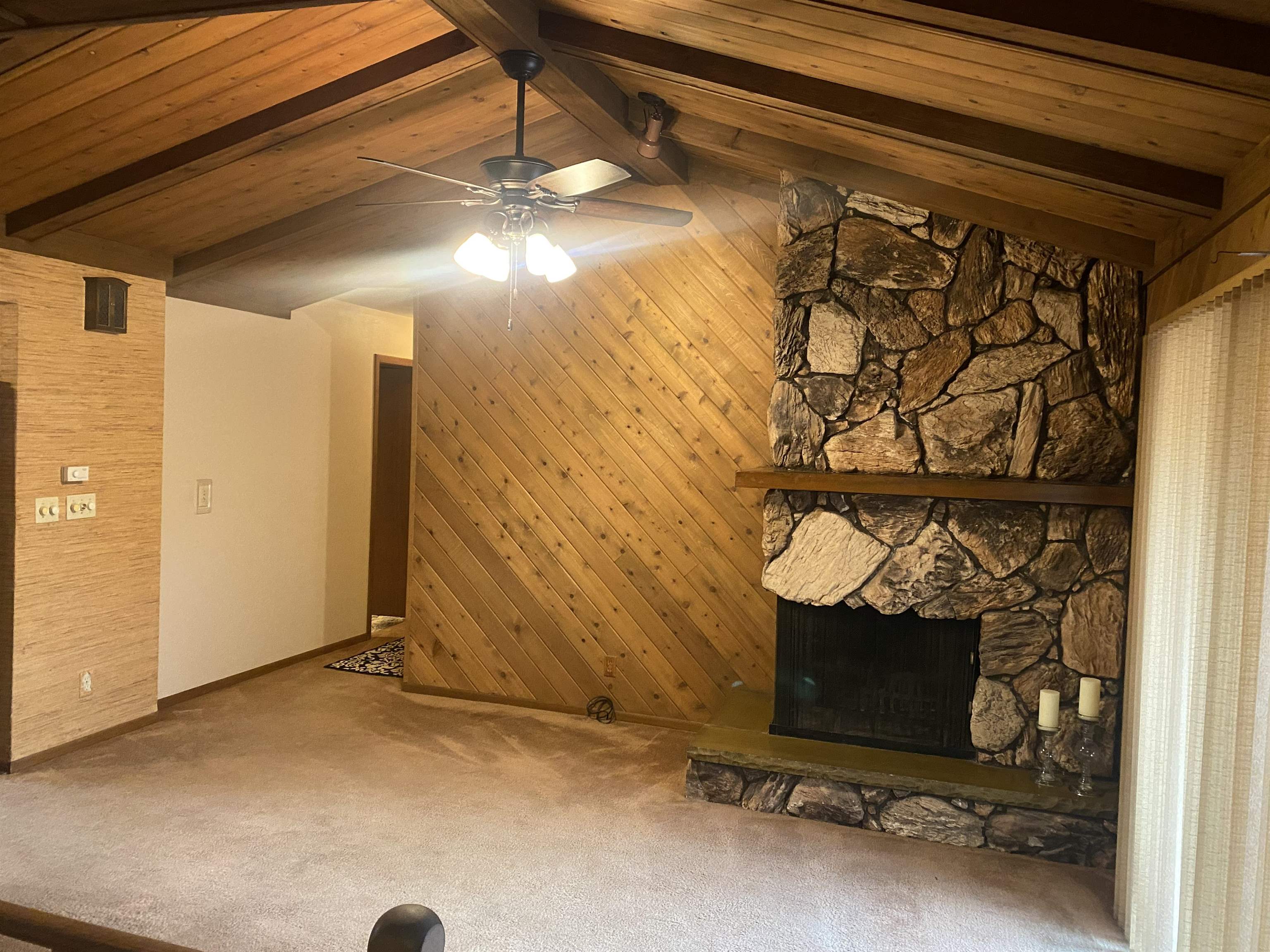 4006 Highcrest Road Rockford, IL 61107 - Photo 7 of 18 a view of a room with wooden walls