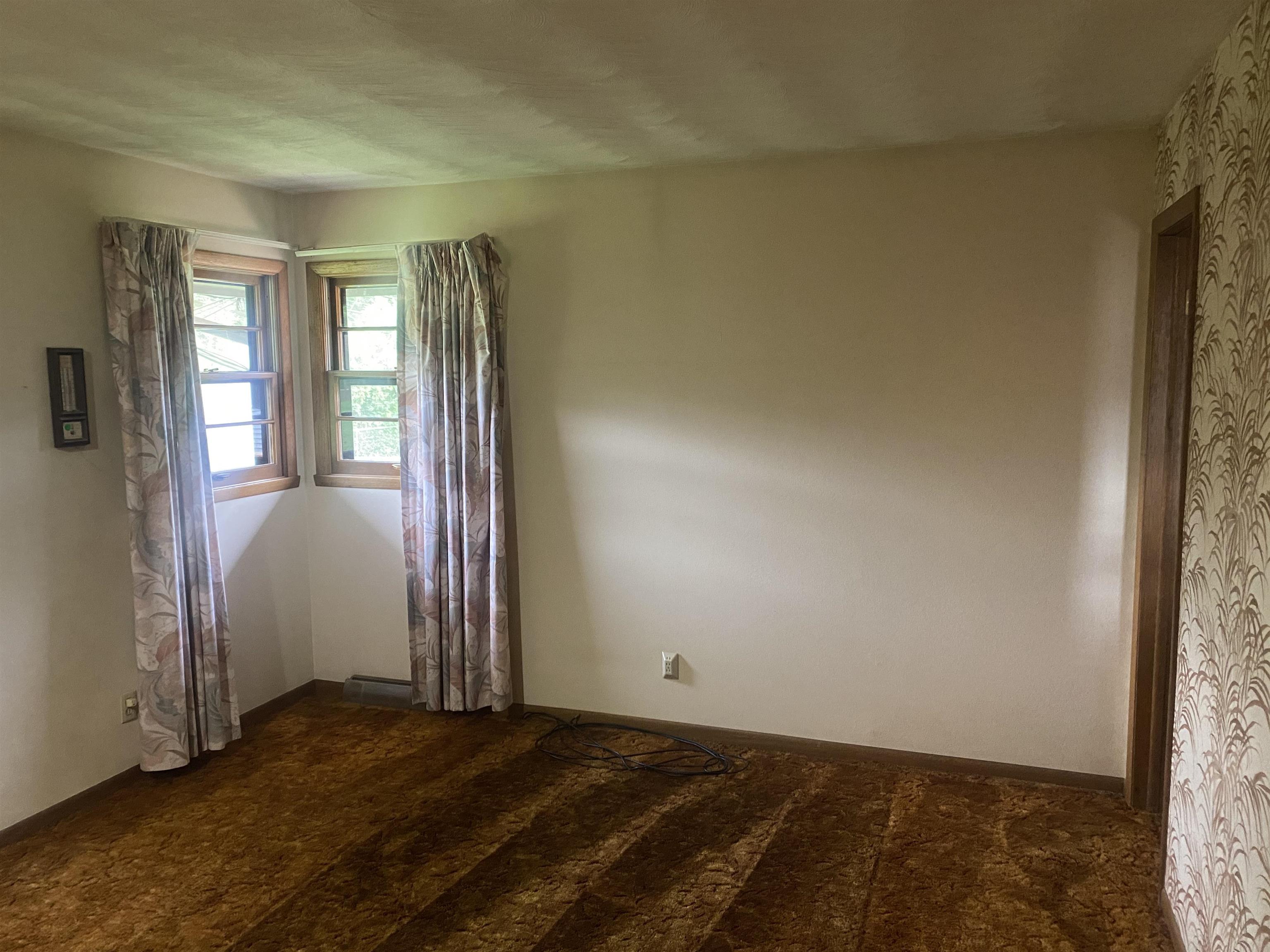 4006 Highcrest Road Rockford, IL 61107 - Photo 8 of 18 an empty room with windows