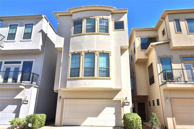 a bath tub sitting next to a white sink