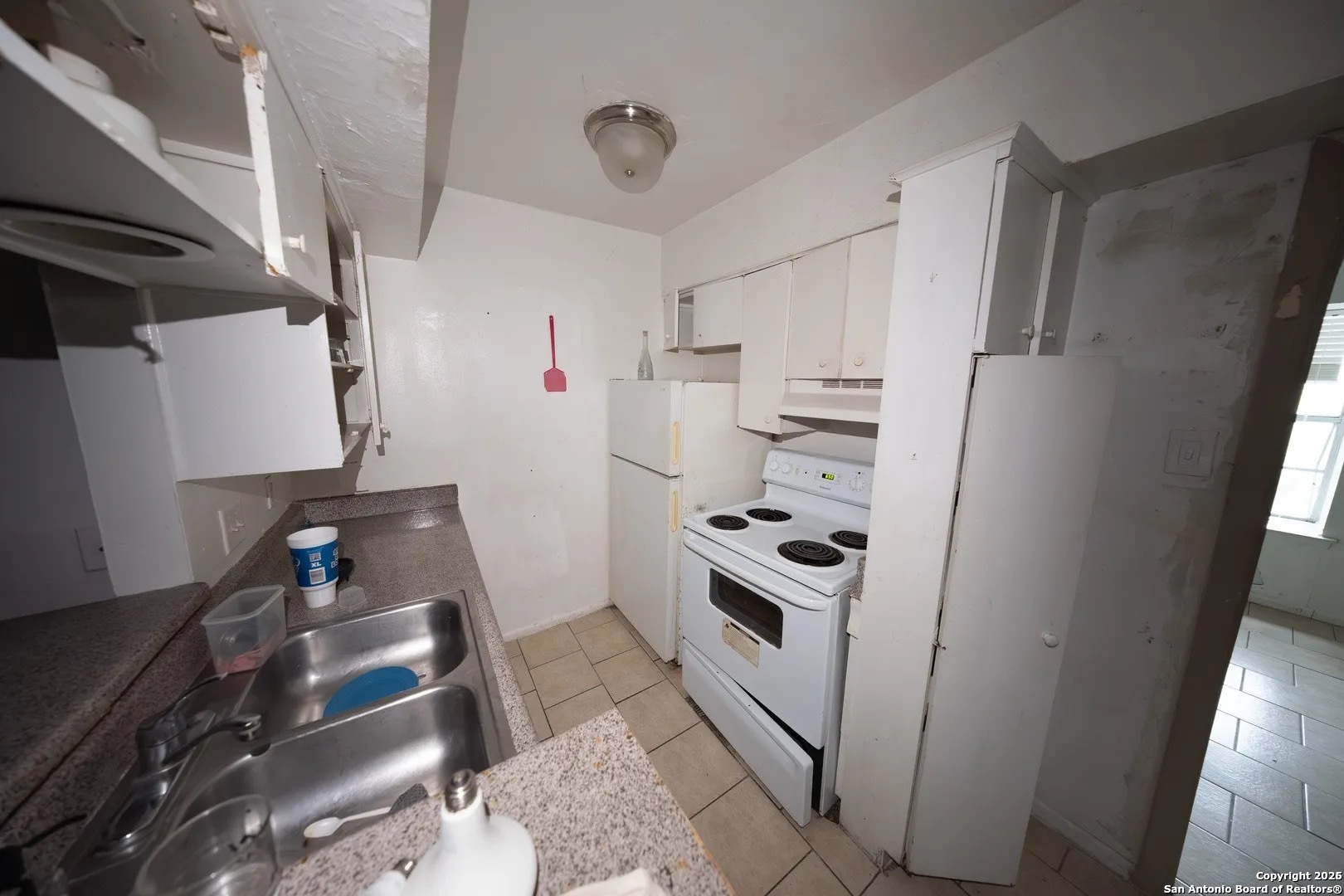 170 De Chantle Road, Unit 709 San Antonio, TX 78201 - Photo 7 of 24 a room with storage and utility