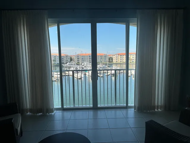 a view of a room that has a large window