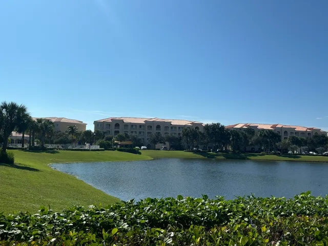 a view of a lake with a big yard