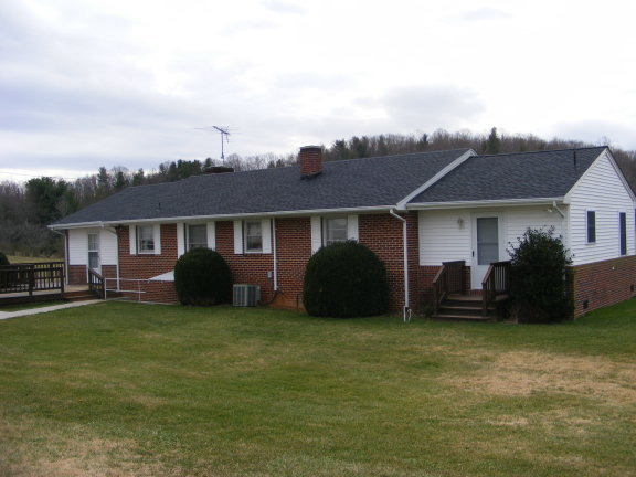 227 Remington Road Southeast Floyd, VA 24091 - Photo 2 of 11 a view of a house with a yard and sitting area
