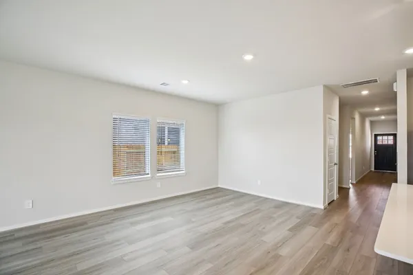 a view of kitchen with wooden floor