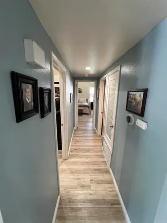 a bedroom with a bed and dresser