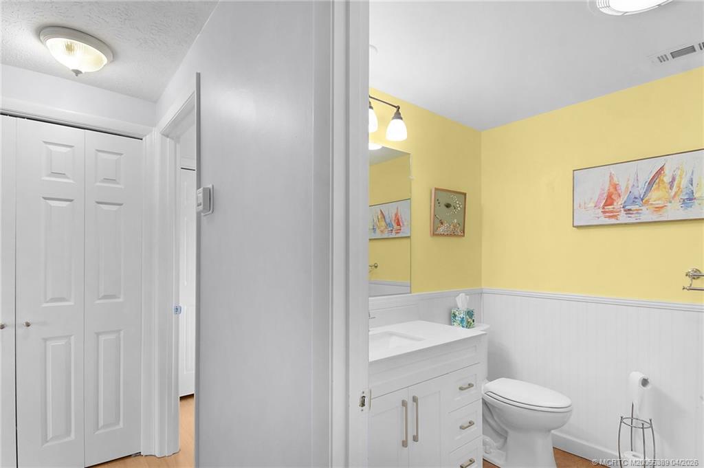 4729 Southeast Glen Ridge Trail Stuart, FL 34997 - Photo 48 of 81 a bathroom with a sink a toilet and shower