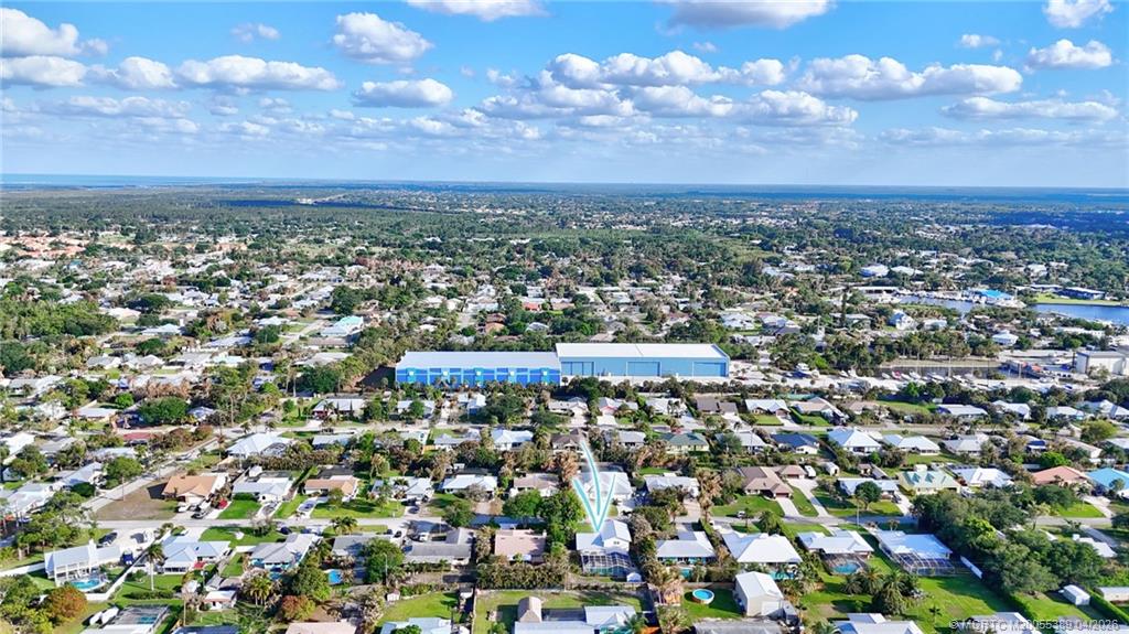 4729 Southeast Glen Ridge Trail Stuart, FL 34997 - Photo 67 of 81 an aerial view of a city with lots of residential buildings
