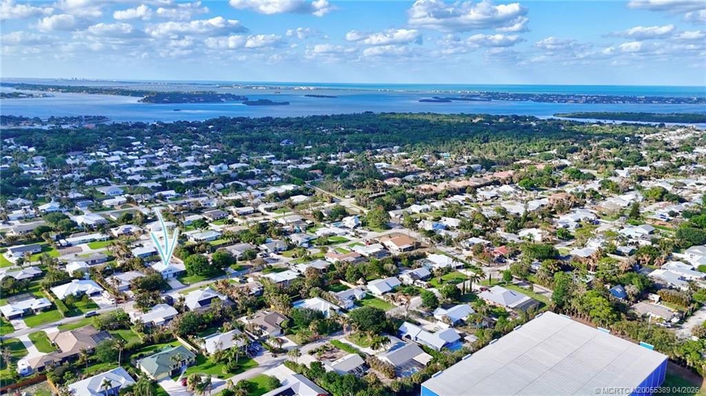 4729 Southeast Glen Ridge Trail Stuart, FL 34997 - Photo 71 of 81 an aerial view of residential houses with outdoor space