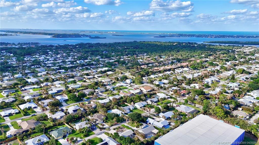 4729 Southeast Glen Ridge Trail Stuart, FL 34997 - Photo 72 of 81 an aerial view of residential houses with outdoor space
