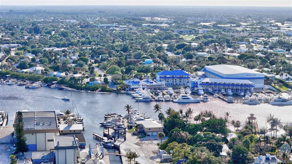 4729 Southeast Glen Ridge Trail Stuart, FL 34997 - Photo 79 of 81 an aerial view of a city with lots of residential buildings