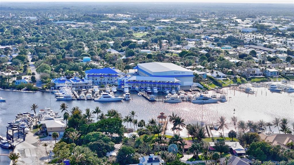 4729 Southeast Glen Ridge Trail Stuart, FL 34997 - Photo 80 of 81 an aerial view of a city with a lake view
