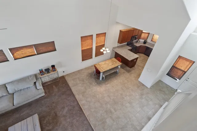 a living room with furniture and a couch