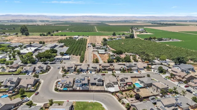 an aerial view of a city with lots of residential buildings