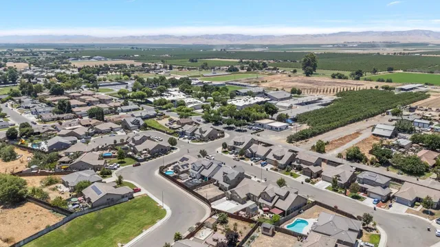 an aerial view of a city with lots of residential buildings