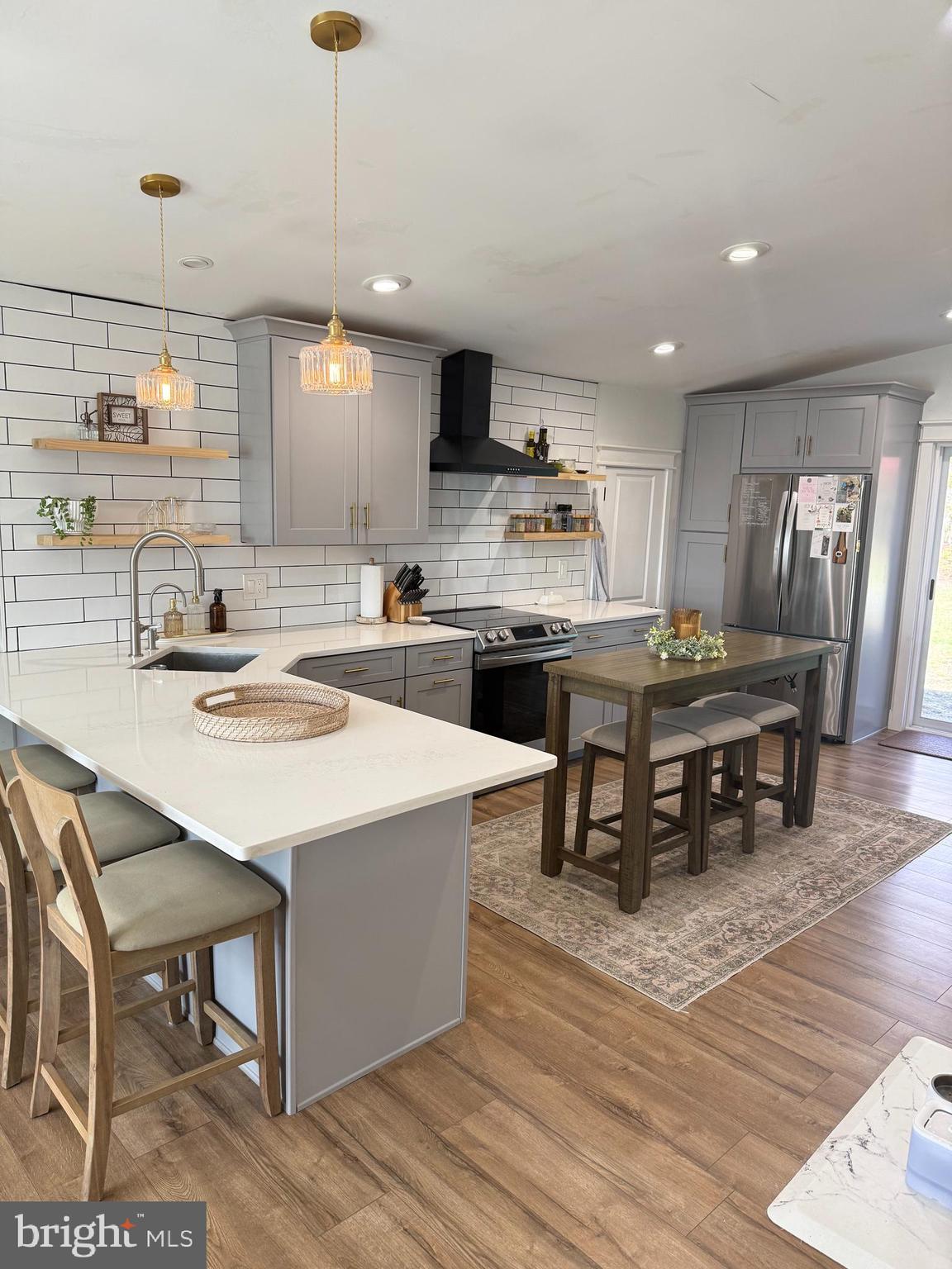 46 Zimmerman Road Tabernacle, NJ 08088 - Photo 1 of 20 a kitchen with stainless steel appliances kitchen island granite countertop a sink a stove and a refrigerator