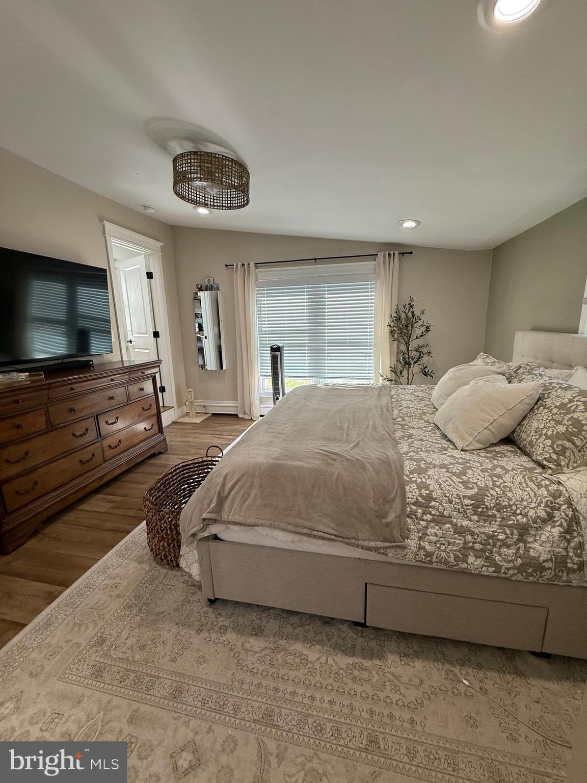 46 Zimmerman Road Tabernacle, NJ 08088 - Photo 8 of 20 a spacious bedroom with a bed and a flat screen tv