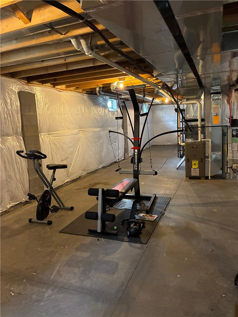 18 Dona Lea Road Perinton, NY 14450 - Photo 28 of 29 Currently used as an exercise area, the basement offers opportunity for expansion of living space.