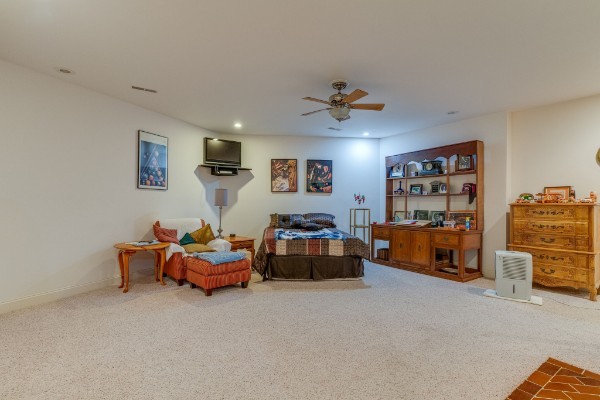 4664 New Cut Road Greenbrier, TN 37073 - Photo 28 of 85 a living room with furniture and a flat screen tv