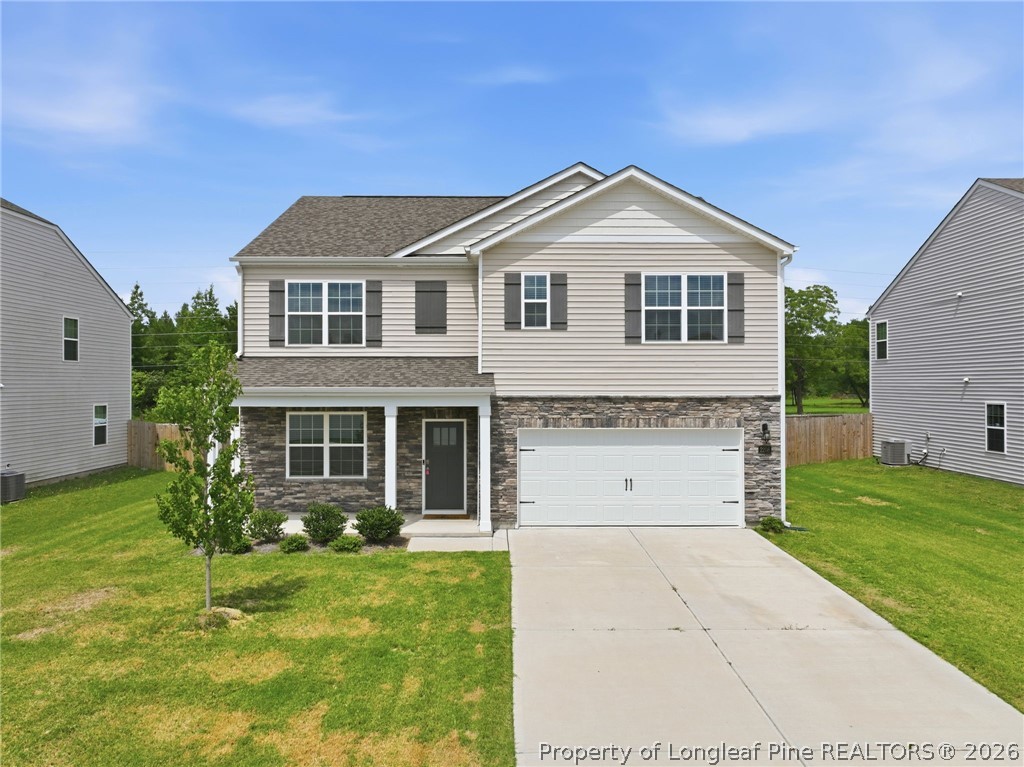 2208 Clydesmill Road Fayetteville, NC 28314 - Photo 1 of 26 a view of a yard in front view of a house