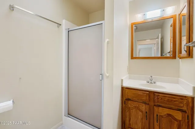 an aerial view of a house with a garden