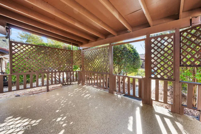 a kitchen with stainless steel appliances granite countertop a refrigerator a stove top oven a sink and dishwasher