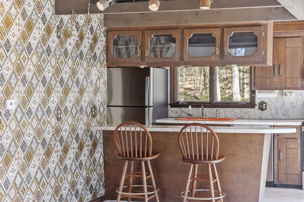 22 Briggs Road Petersham, MA 01366 - Photo 19 of 41 a kitchen with a refrigerator and a sink