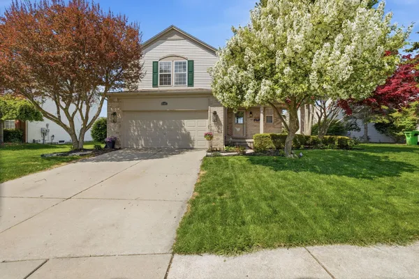 $405,000 | 56807 Winding Creek Drive, Macomb, MI 48042