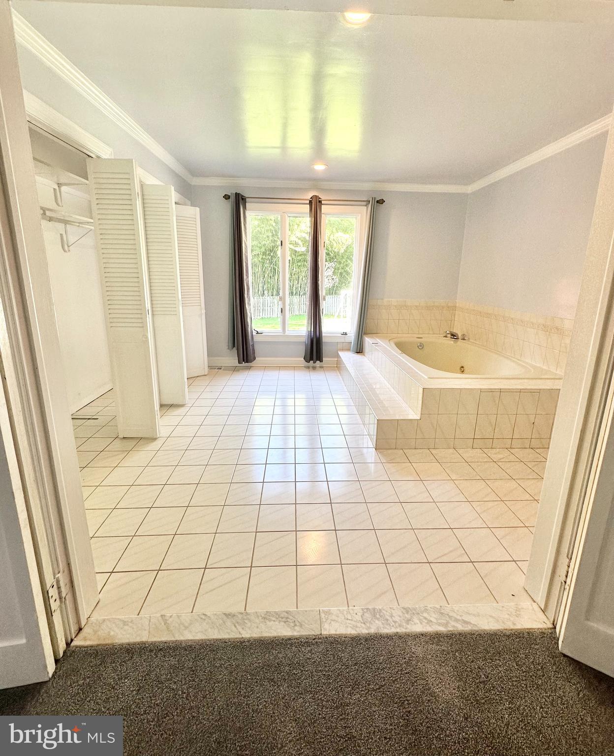 12312 Loch Carron Circle Fort Washington, MD 20744 - Photo 14 of 57 a view of an empty room with a window