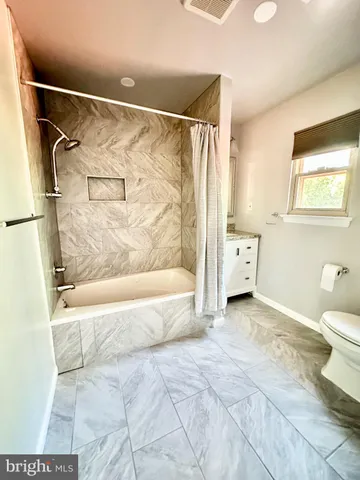 a view of swimming pool with lounge chair