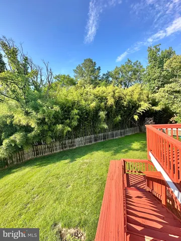 a view of a living room and kitchen