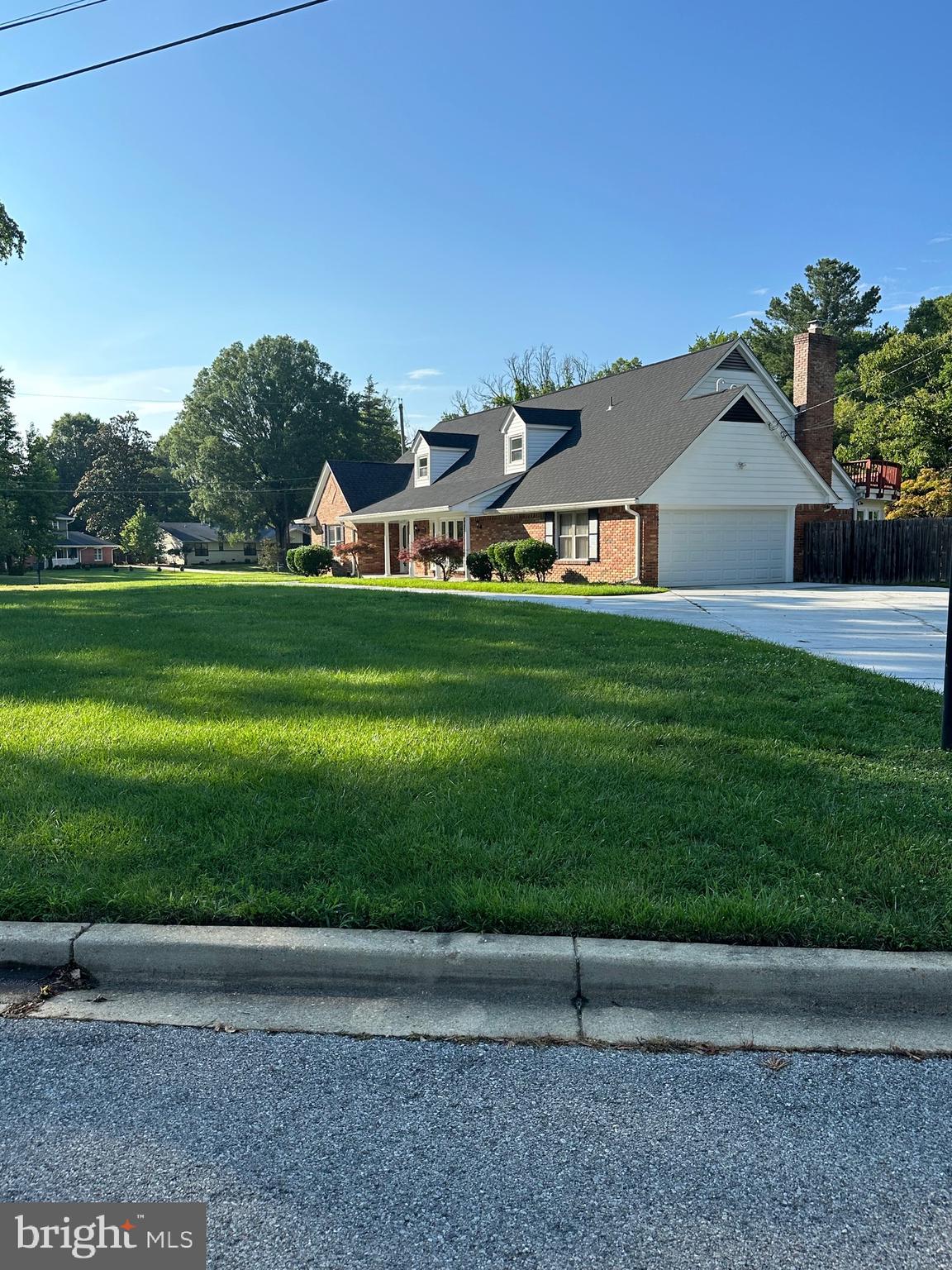 12312 Loch Carron Circle Fort Washington, MD 20744 - Photo 56 of 57 a front view of a house with a yard