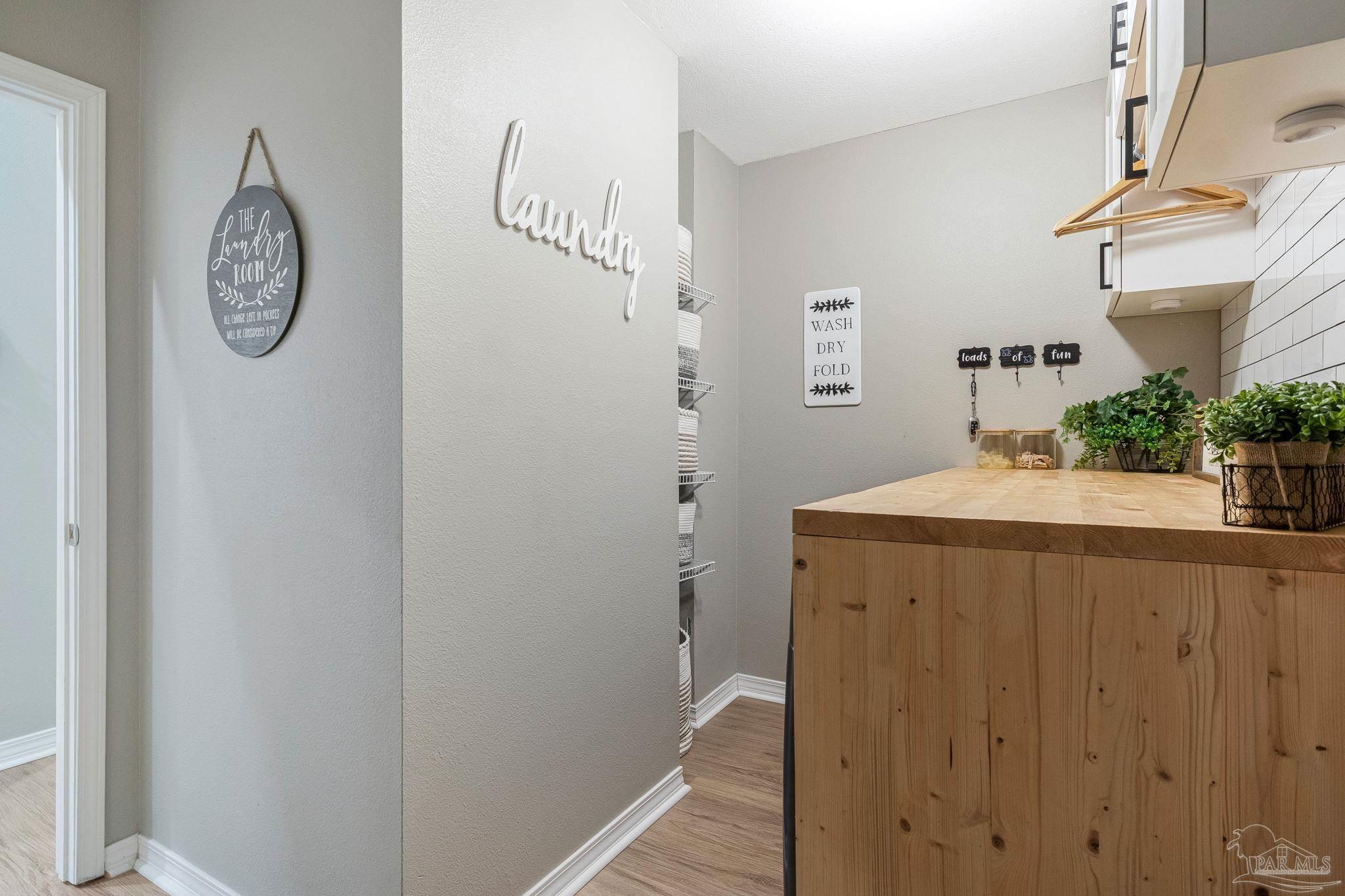 2407 Pine Forest Road Cantonment, FL 32533 - Photo 28 of 60 a bathroom with a sink and a mirror