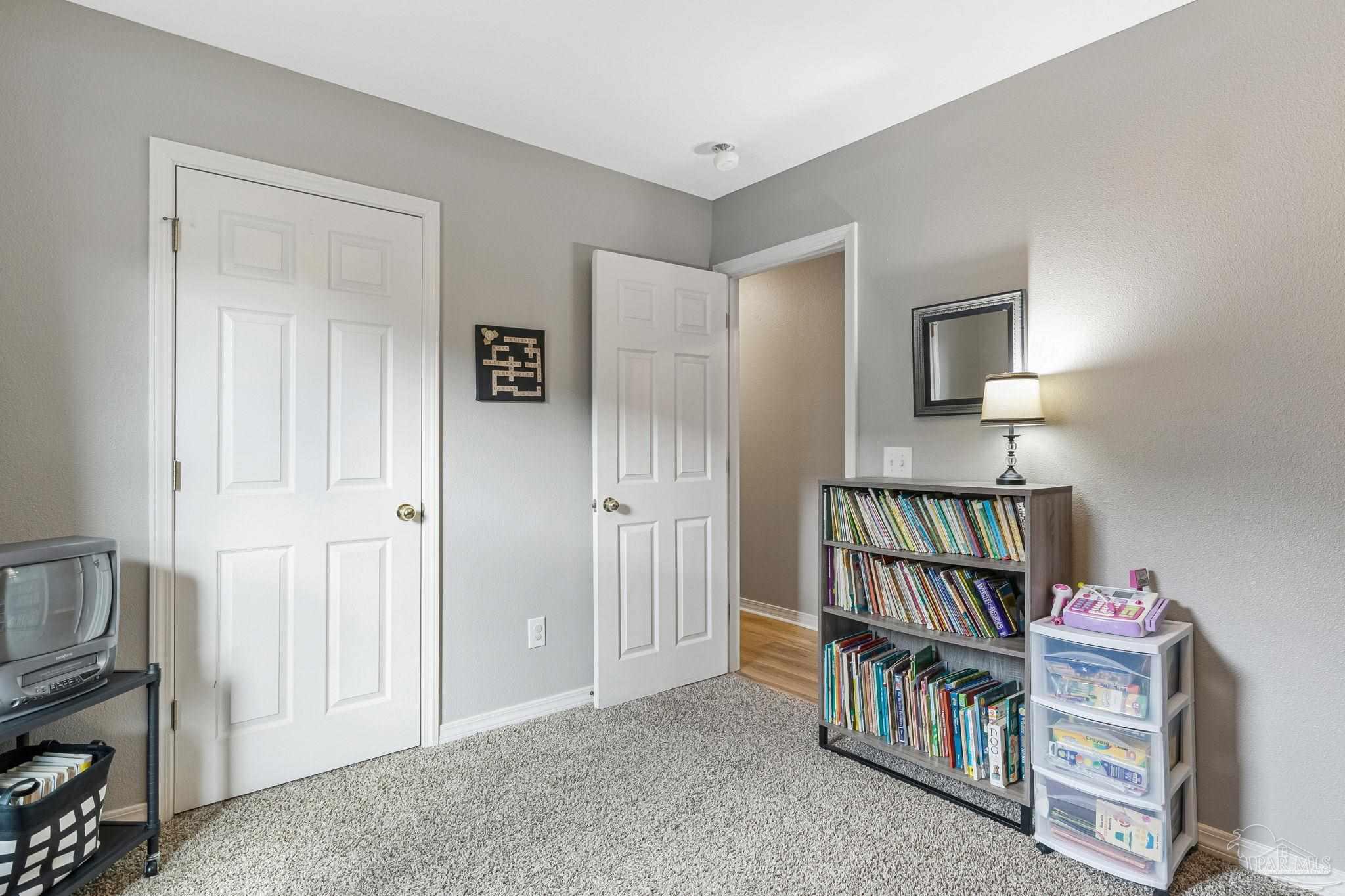 2407 Pine Forest Road Cantonment, FL 32533 - Photo 33 of 60 a view of empty room with furniture and baby crib