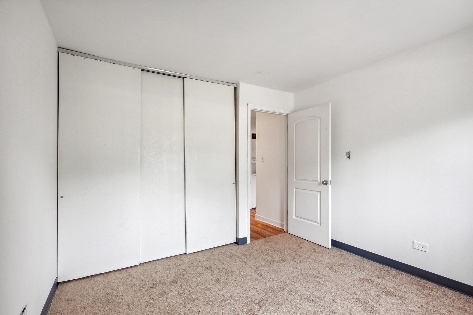 1464 Stonebridge Circle, Unit E2 Wheaton, IL 60189 - Photo 9 of 14 a view of an empty room