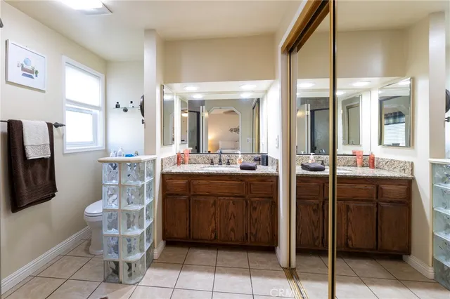 a kitchen with a sink and a refrigerator