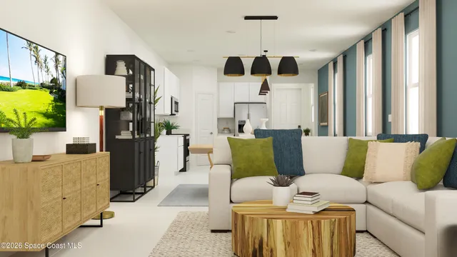 a living room with furniture and a chandelier