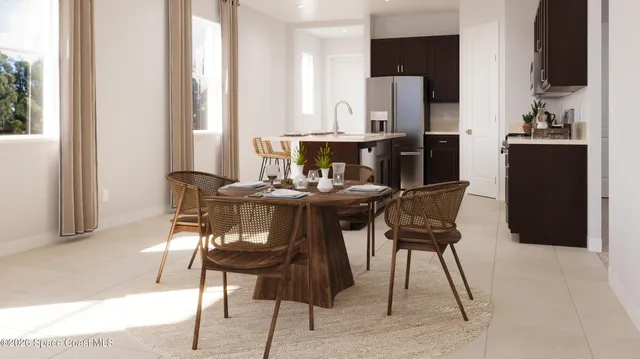 a dining room with furniture and window