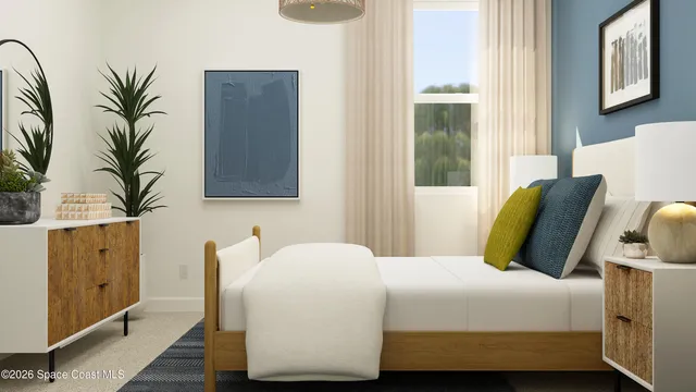 a bedroom with a bed and window