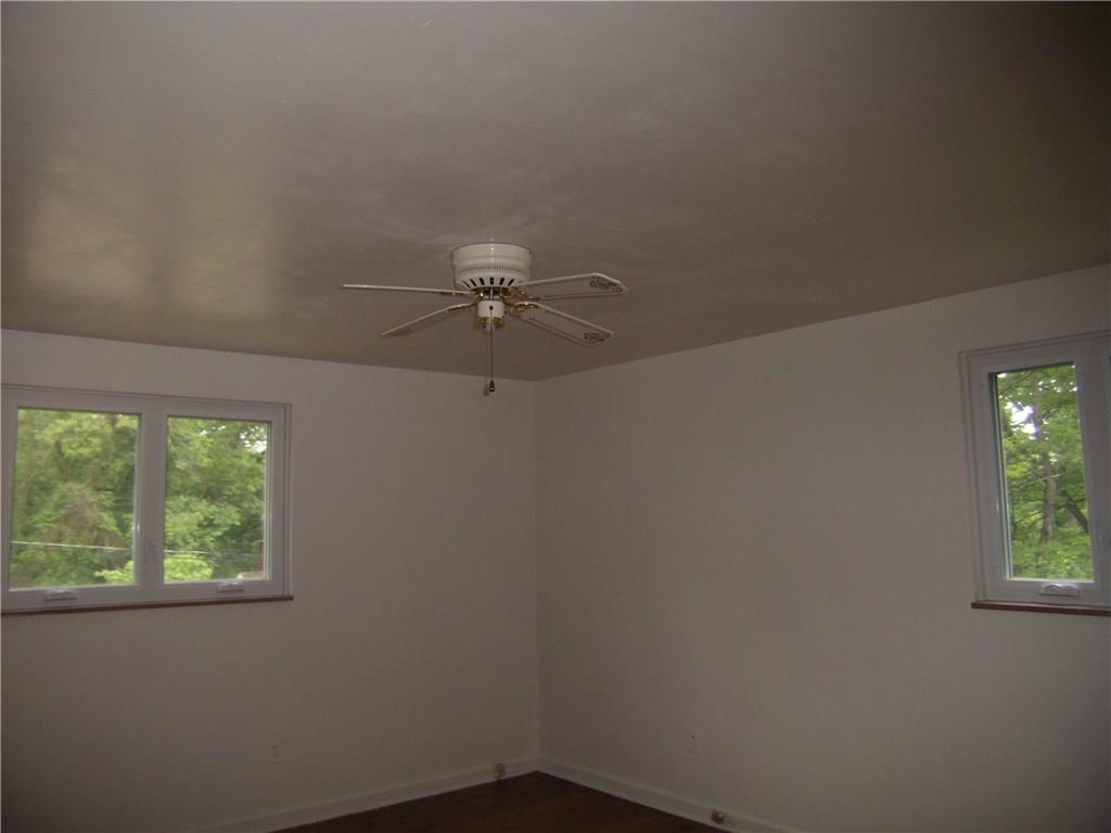 712 Ramon Drive Pittsburgh, PA 15238 - Photo 13 of 25 Another view of the Master bedroom is flanked with 2 widows and 2 closets!