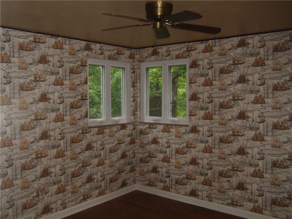 712 Ramon Drive Pittsburgh, PA 15238 - Photo 14 of 25 Bedroom 3 also has the beautiful original hardwood flooring and the charming corner windows. Measuring approx. 11 x 11.