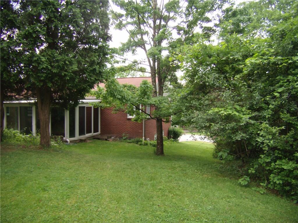 712 Ramon Drive Pittsburgh, PA 15238 - Photo 24 of 25 View of the charming 3 season room. A favorite place for the owner and family!