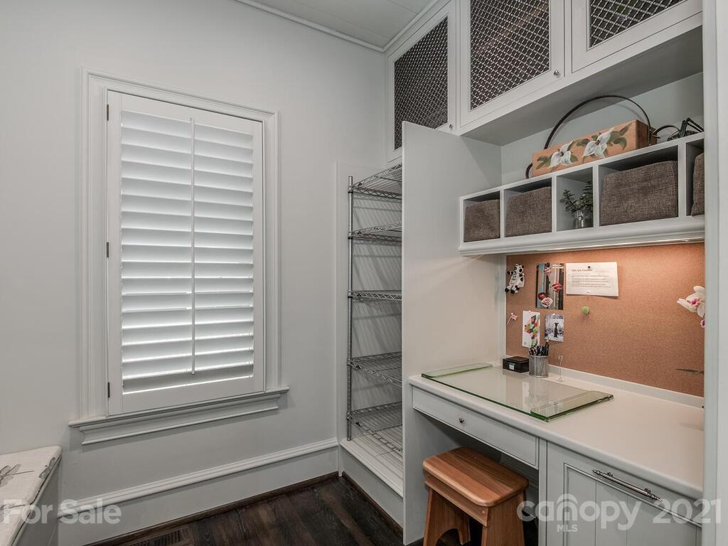 1056 Bolling Road Charlotte, NC 28207 - Photo 24 of 48 a kitchen with a sink and a window
