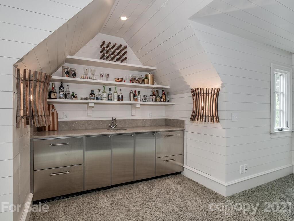 1056 Bolling Road Charlotte, NC 28207 - Photo 45 of 48 a view of staircase with white walls