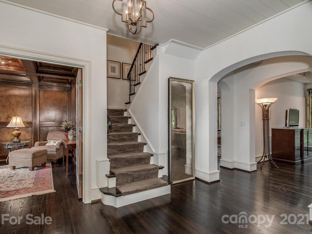 1056 Bolling Road Charlotte, NC 28207 - Photo 6 of 48 a view of entryway and hall with wooden floor